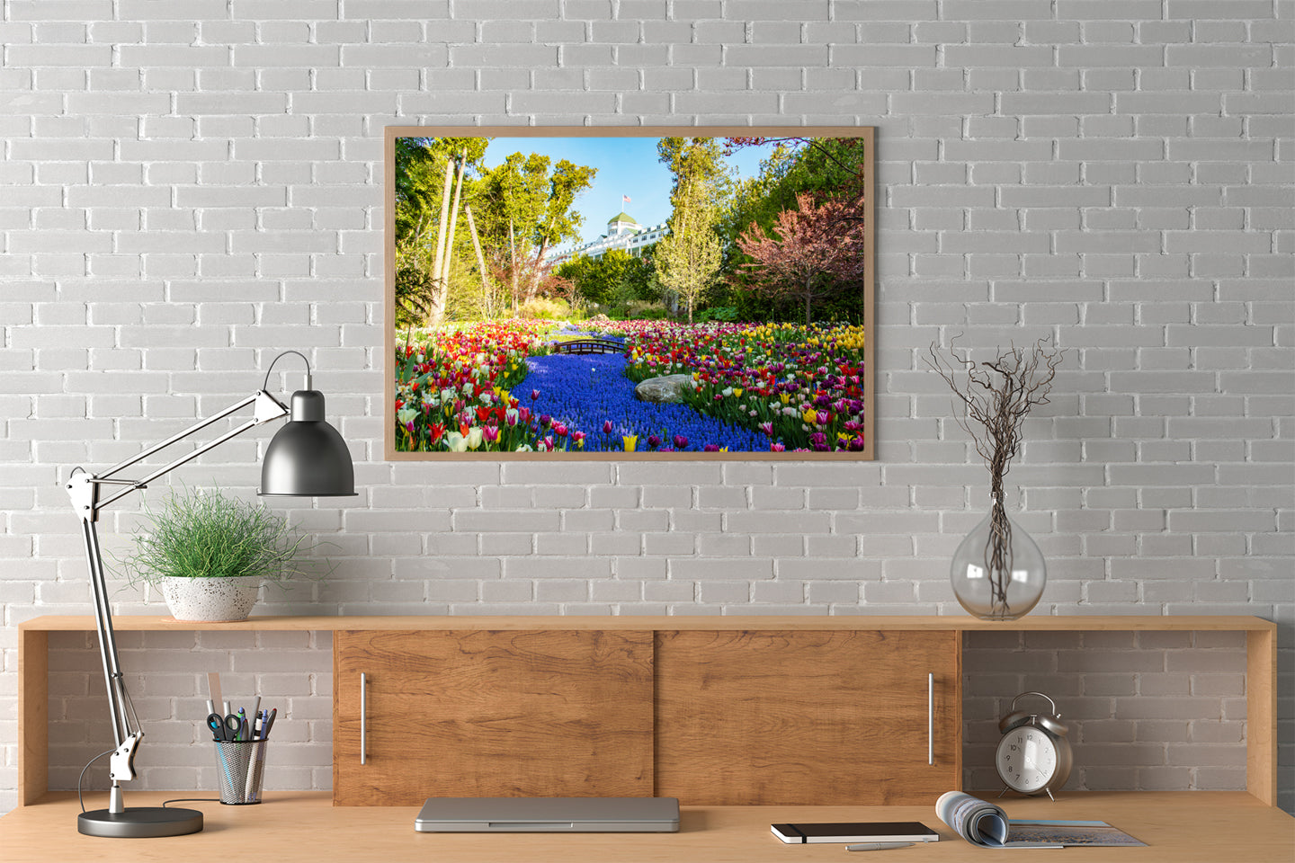 Savor your memories of Mackinac Island with Grand Hotel wall art. This Mackinac Island photograph by Jennifer Wohletz features a river of grape hyacinths and brightly colored tulips is a cheerful feast for your senses in Grand Hotel's Secret Garden.