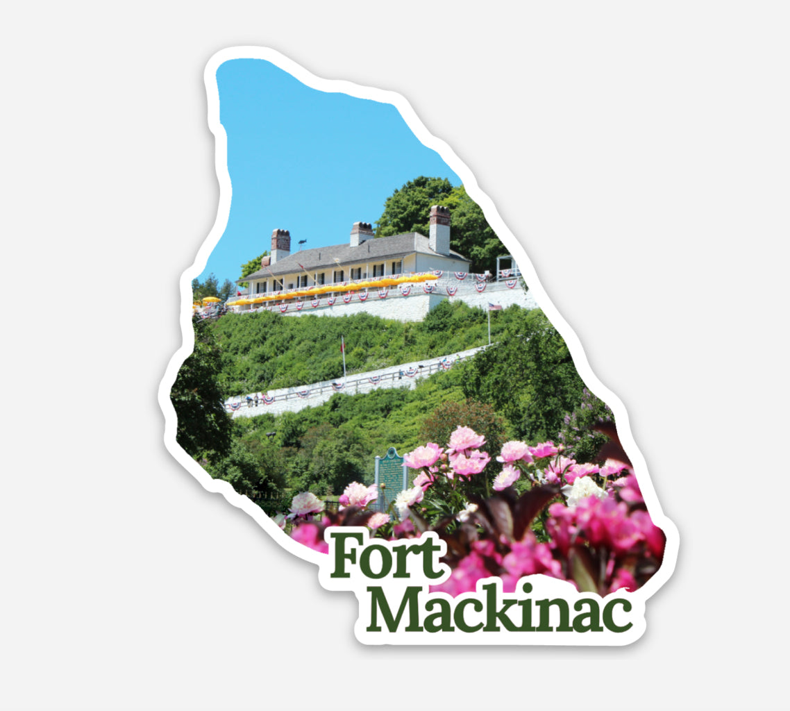 This die cut vinyl sticker features a photo of Fort Mackinac framed in the shape of the map of Mackinac Island.