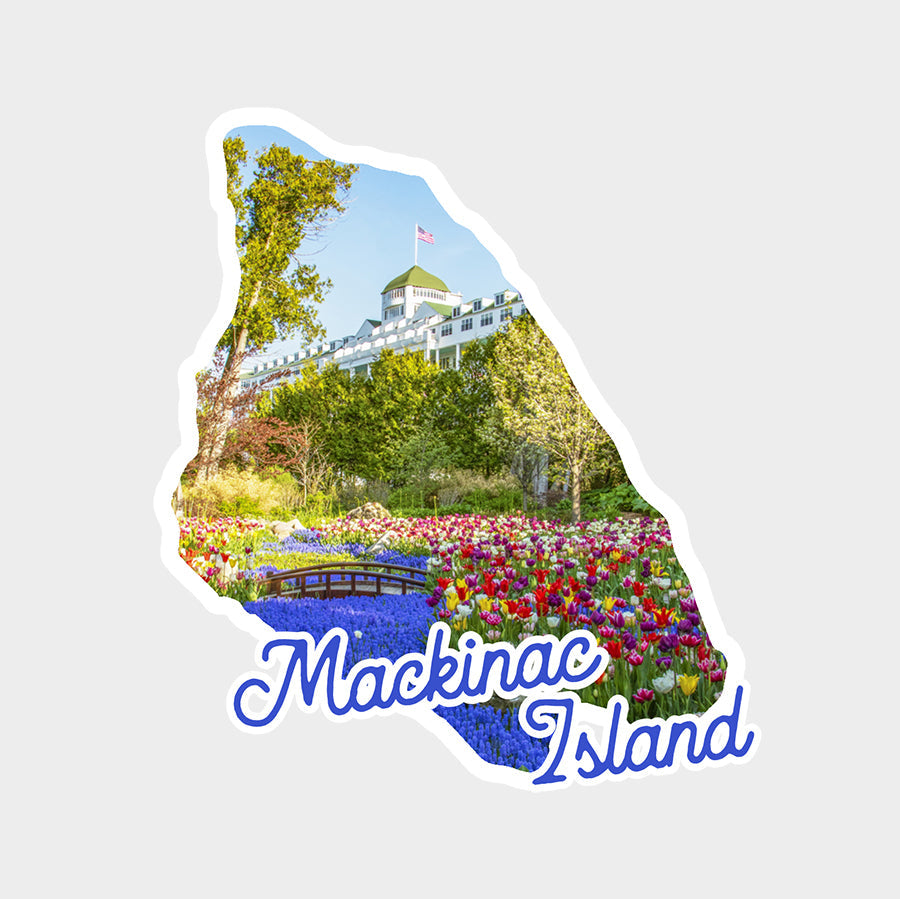 Grand Hotel sticker. This die cut vinyl sticker features grape hyacinths and daffodils blooming in Grand Hotel's Secret Garden framed in the shape of the map of Mackinac Island.