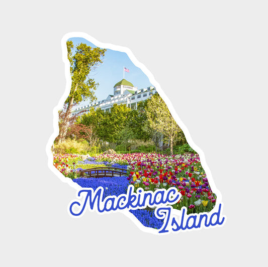 Grand Hotel sticker. This die cut vinyl sticker features grape hyacinths and daffodils blooming in Grand Hotel's Secret Garden framed in the shape of the map of Mackinac Island.