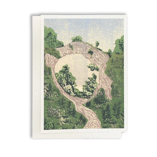 A casually elegant card featuring a digital reproduction of Natalia’s block print design featuring the iconic Arch Rock on Mackinac Island, Michigan.&nbsp; Designed by award-winning printmaker Natalia Wohletz of Peninsula Prints.