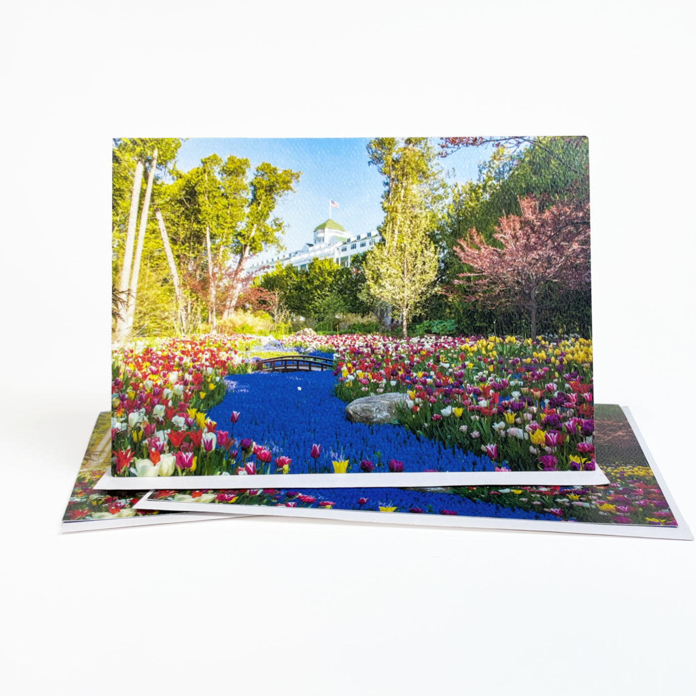 Blank greeting card featuring a photograph of Grand Hotel's Secret Garden in spring by local artist Jennifer Wohletz of Mackinac Memories. 