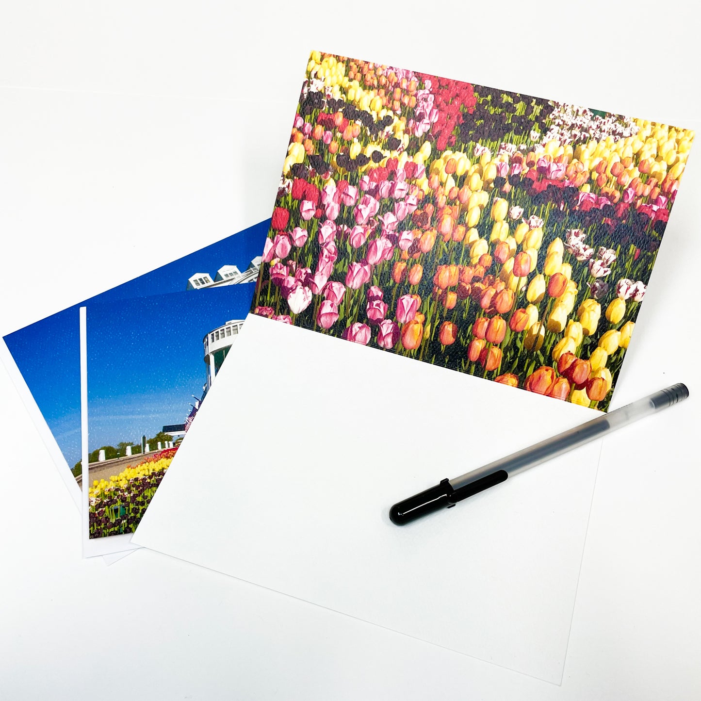 Blank greeting card featuring a photograph of tulips blooming at the Grand Hotel on Mackinac Island by local artist Jennifer Wohletz of Mackinac Memories. 