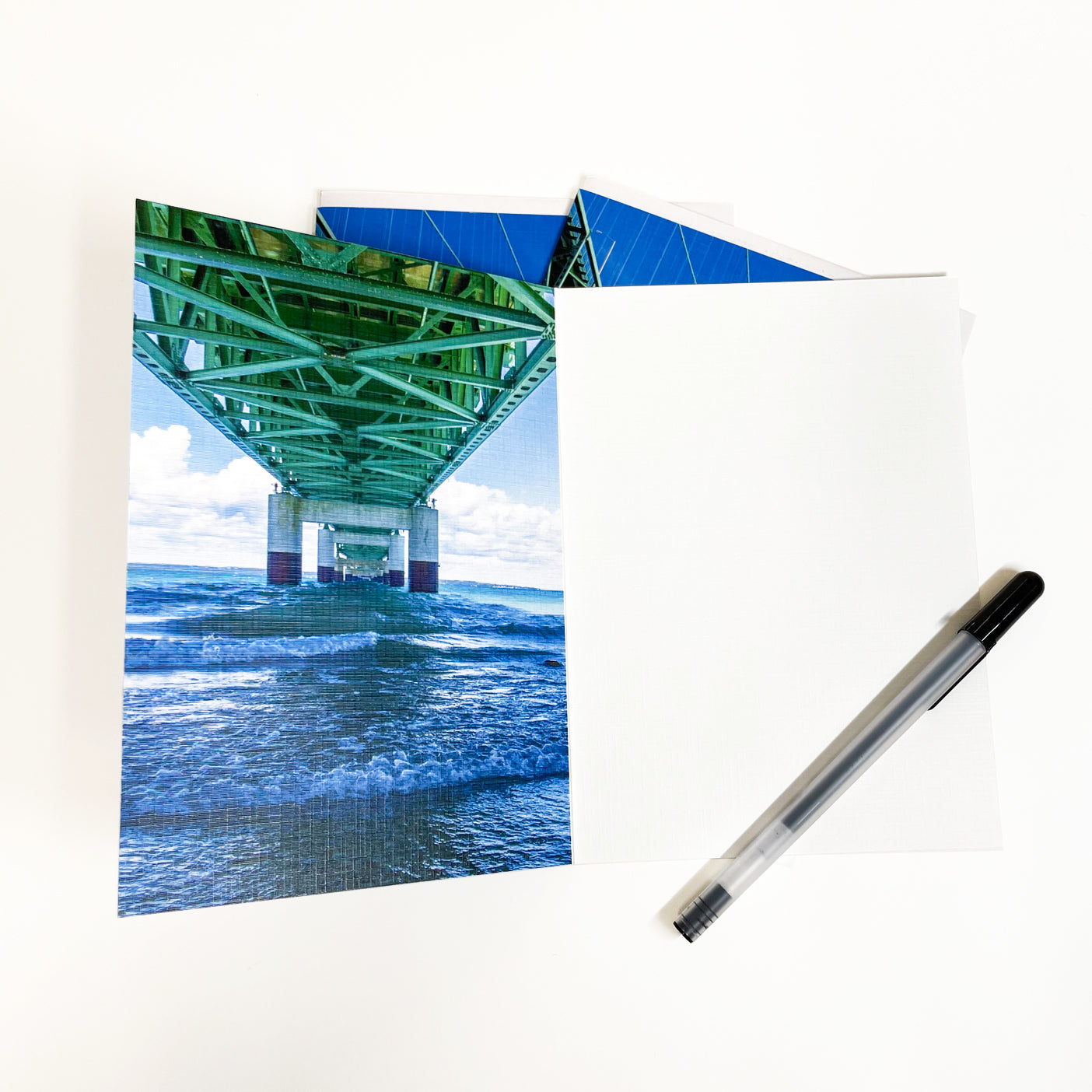 Blank greeting card featuring a photograph of the Mackinac Bridge by Michigan artist Jennifer Wohletz of Mackinac Memories.  